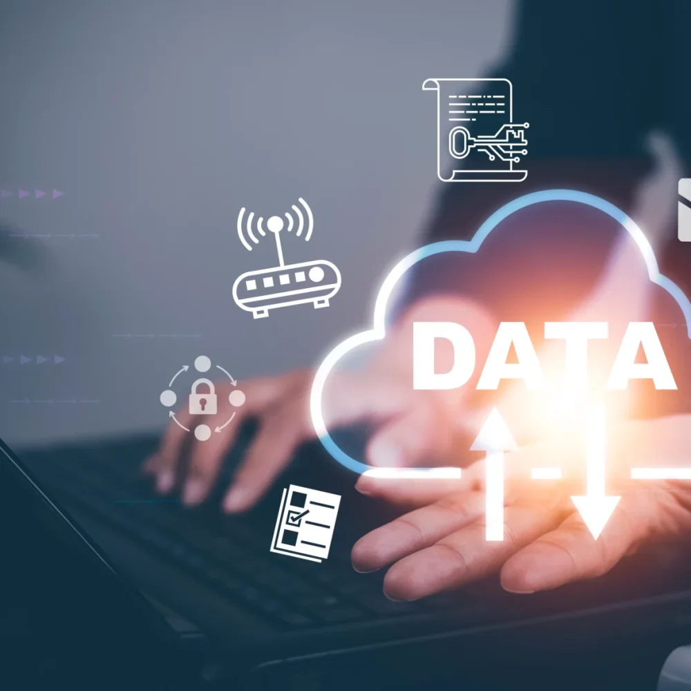 hand-using-laptop-with-analytics-data-management-system-computer-hands-working-laptop-cloud-network-graphic-overlay-connected-database-corporate-strategy-finance